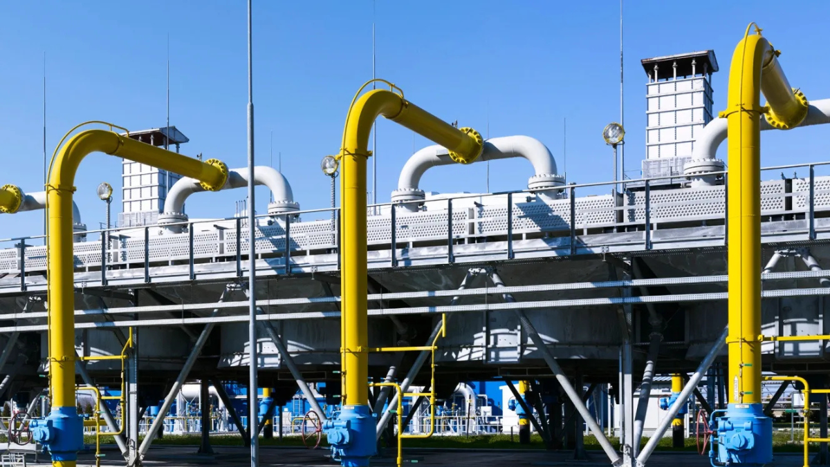 Gas infrastructure with bright yellow pipelines feeding into processing units.